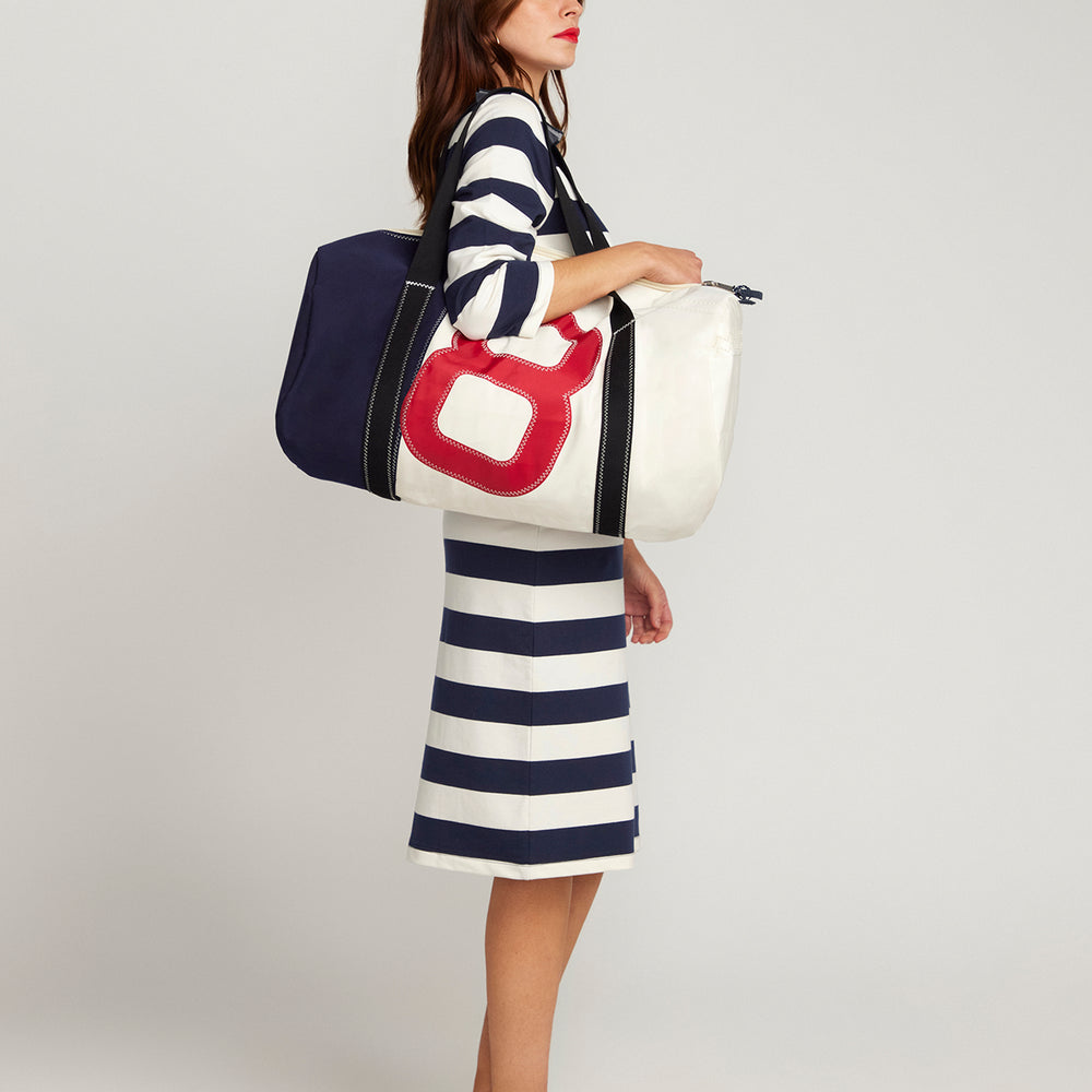 
                      
                        The Françoise Navy and Cream Stripe Dress
                      
                    