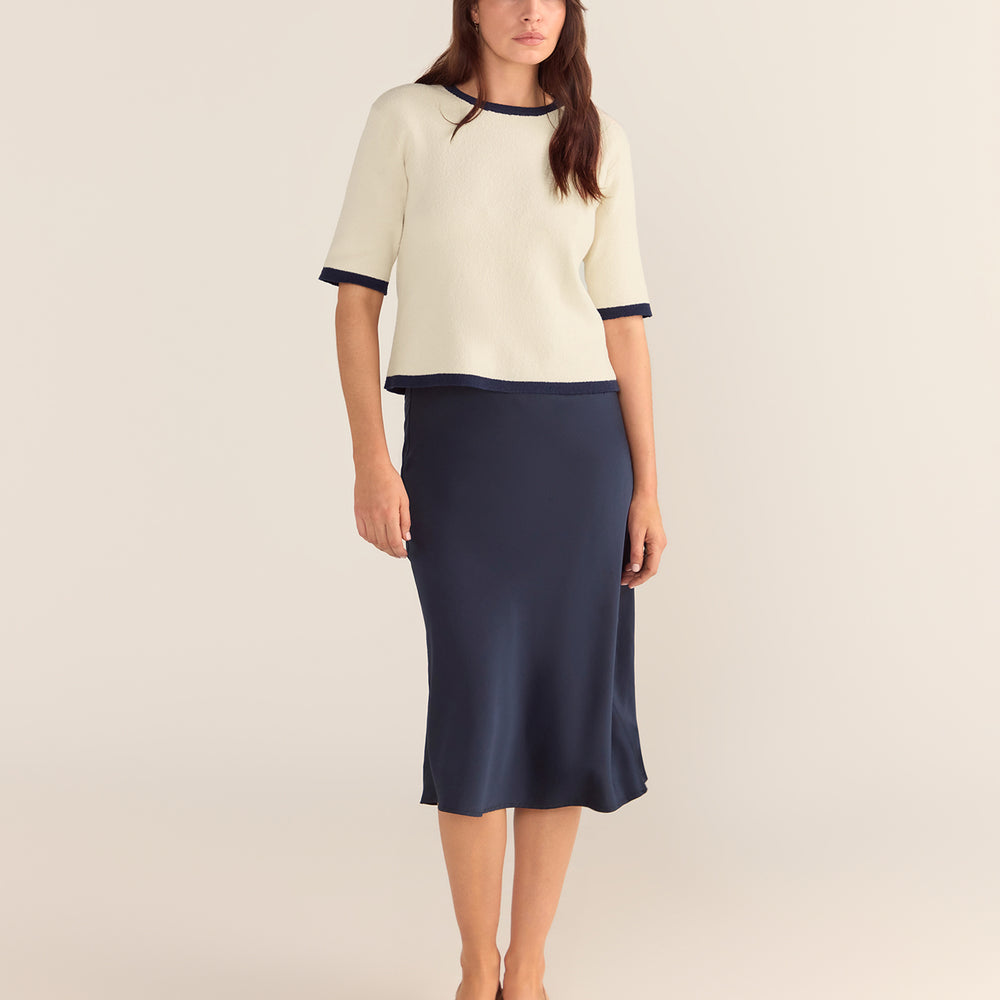 
                      
                        Bouclé Textured Top - Cream Base Navy Trim
                      
                    